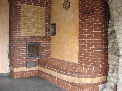 See through contra-flow heater faced in artisanal coal fired brick.