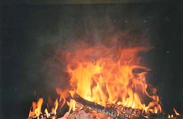 various stages in the combustion of the same small wood load, image 3