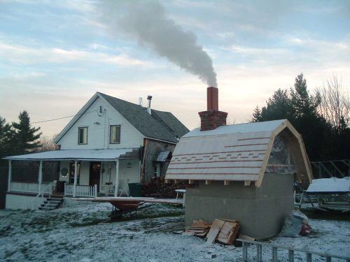 The flue tile on top of the chimney was an experiment to see if the avaloir and chimney would draw better