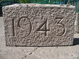 Date stone. 21 x 12 x 5 inches.